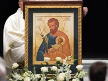 In 2021, the Knights of Columbus announced the selection of this icon of St. Joseph holding the Child Jesus as the centerpiece of the current K of C pilgrim icon prayer program. The original icon was created (or "written") by Élizabeth Bergeron, an iconographer in Montréal, based on a drawing by Alexandre Sobolev.