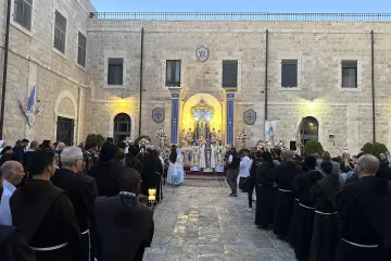 Palestinian Christians participate in a Marian procession