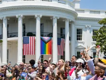 The Progress Pride flag is shown above (center flag) at a White House "Pride" celebration on June 10, 2023.