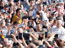 Pope Francis greets members of the international Catholic movement Communion and Liberation in St. Peter's Square Oct. 15, 2022.