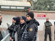 Turkish police stand guard outside the scene of an armed attack at a Catholic church in Istanbul, Turkey, on Jan. 28, 2024.