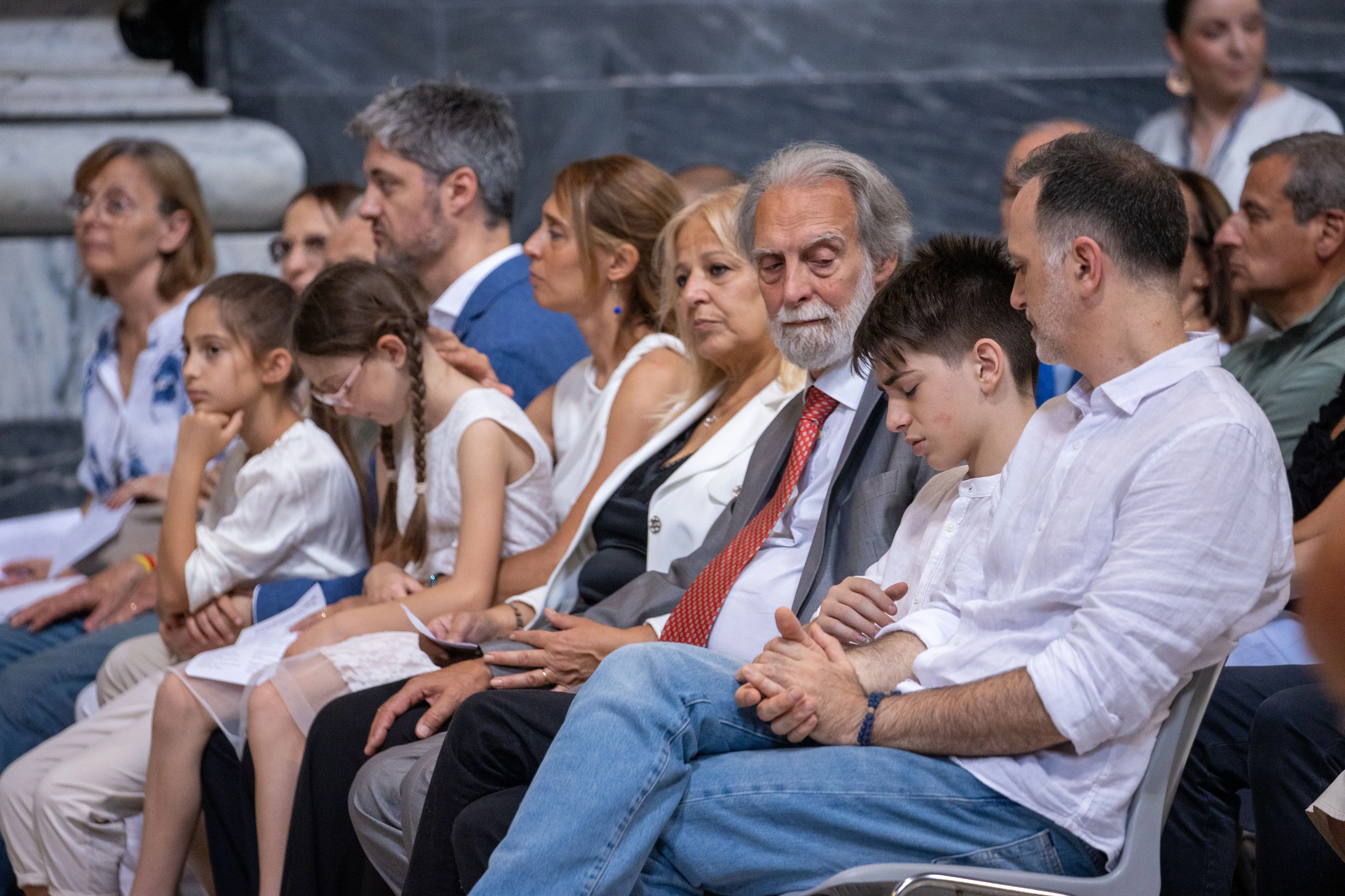 Roberto Corbella (center, with tie) and other family and friends of Chiara Corbella Petrillo attend the closing of the diocesan phase of the investigation into her life and virtues in Rome on Friday, June 21, 2024?w=200&h=150