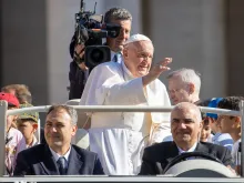 Pope Francis waves to pilgrims at his General Audience in St. Peter's Square at the Vatican, Wednesday, June 26, 2024