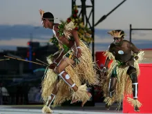 Aboriginal dancers perform an Indigenous welcome ceremony at the opening Mass formally celebrating the start of World Youth Day 2008 at Barangaroo on July 15, 2008, in Sydney.