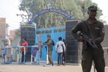 Security forces guard a Catholic church in Pakistan in 2019