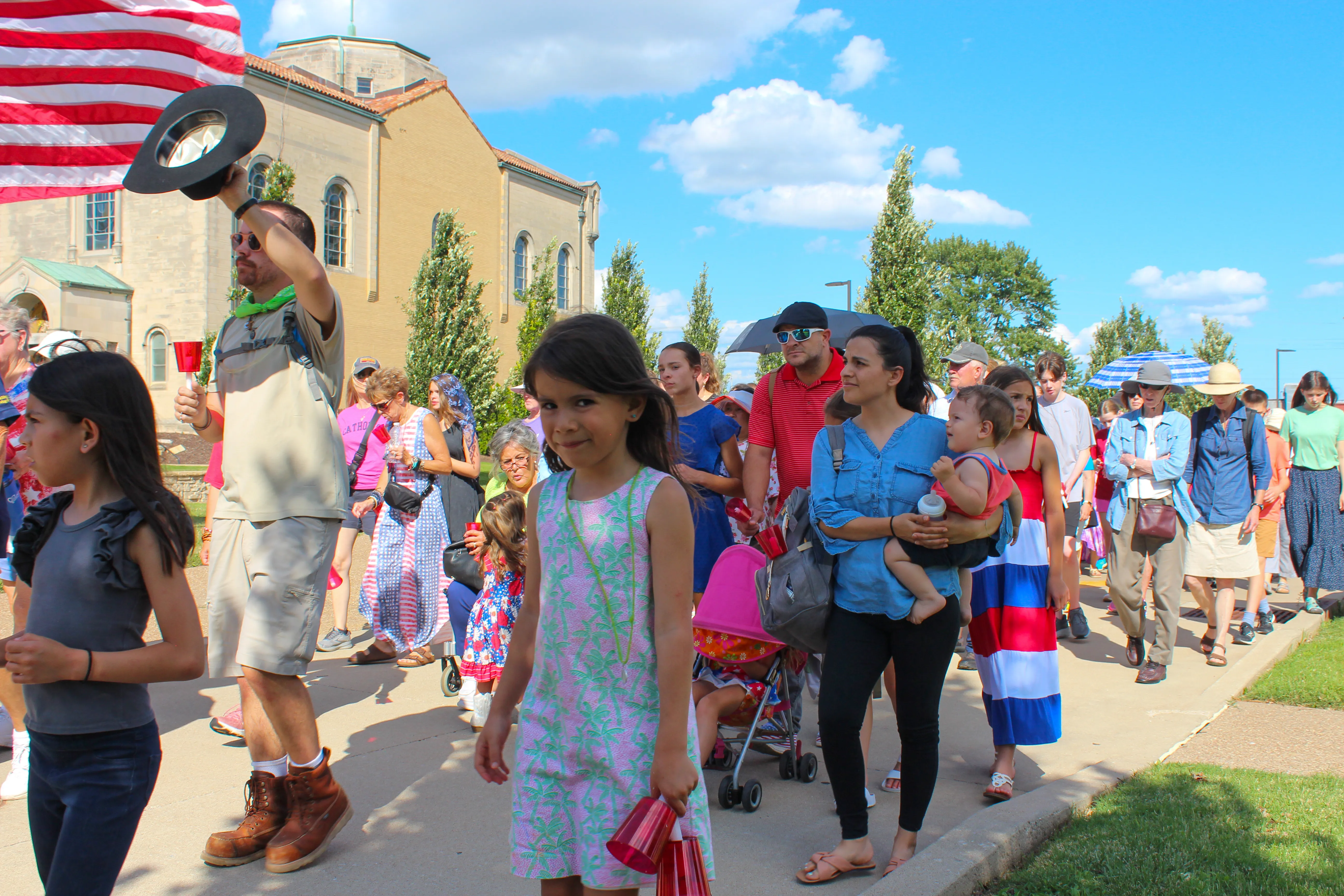 Families joined the procession as the Eucharist left the Shrine of St. Rose Philippine Duchesne, headed for St. Peter Parish.?w=200&h=150