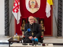 Cardinal Pierbattista Pizzaballa, Latin patriarch of Jerusalem, listens to a question during the May 20, 2024, press briefing with a small group of journalists at the Latin Patriarchate headquarters in Jerusalem about his recent visit to visit the Catholic community in Gaza.