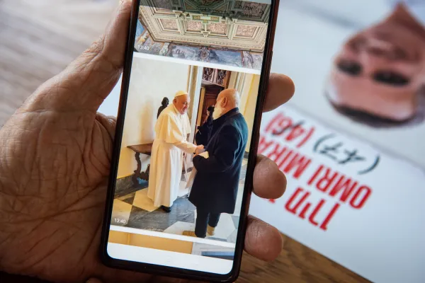 Danny Miran with Pope Francis in Vatican City on April 8, 2024. Danny Miran is the father of Omri Miran, a hostage in Gaza. Since Oct. 7, 2023, Danny Miran has traveled to many countries and has spoken before politicians, diplomats, and religious leaders. The meeting with the pope took place during an audience granted to a delegation of hostage families. “I was looking at him, into his eyes, and it was like looking into my father’s eyes. They were full of mercy and I saw that he cared,” Miran told CNA. Credit: Marinella Bandini