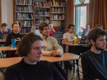 Students of the Studienjahr during a lesson at Beit Josef, the headquarters of the program, within the compound of the Benedictine Abbey of the Dormition in Jerusalem. The Studienjahr program (launched in 1973) is an annual program of ecumenical studies. It brings together every year about 20 German-speaking theology students from all Christians denominations. January 2024.