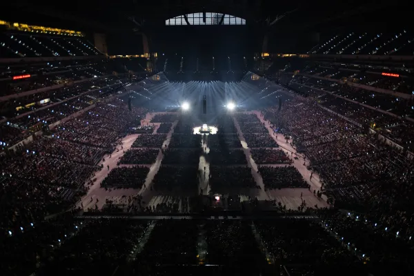 More than 50,000 kneel in adoration of the Eucharist at the National Eucharistic Congress held at Lucas Oil Stadium in downtown Indianapolis. Credit: Jeffry Bruno