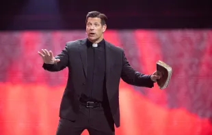 Father Mike Schmitz speaks at the revival session of the National Eucharistic Congress on July 18, 2024. Credit: Jeffrey Bruno