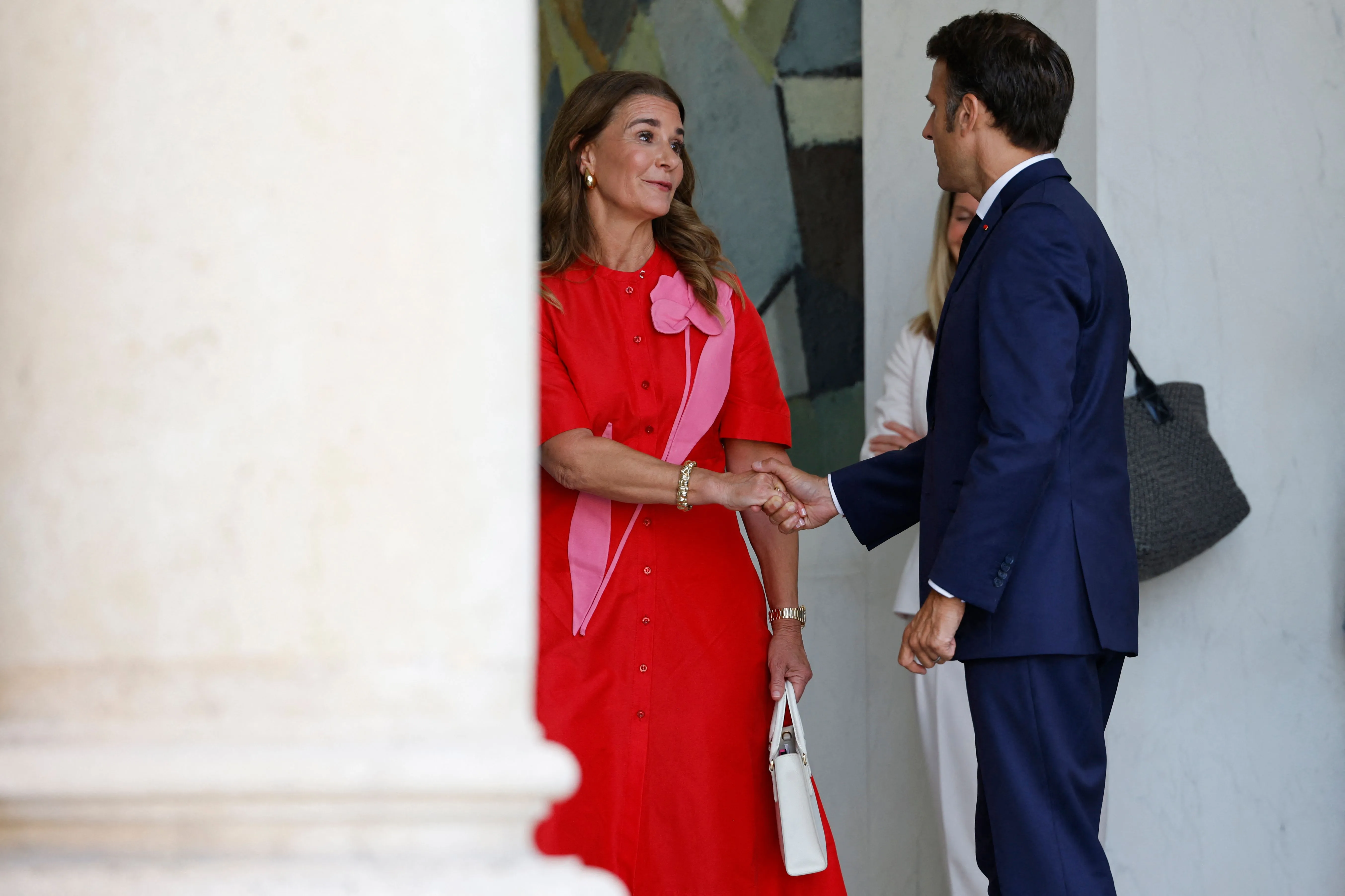 Melinda French Gates shakes hands with French President Emmanuel Macron after a meeting at the Elysee Palace on June 23, 2023.?w=200&h=150