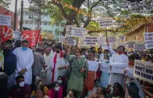 Activists wave placards and chant slogans as they participate in a demonstration against the Protection of Right to Freedom of Religion Bill, also known as the Anti-Conversion Bill, on Dec. 22, 2021, in Bengaluru, India. Credit: Abhishek Chinnappa/Getty Images