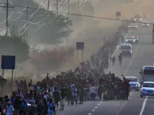 Migrants take part in a caravan toward the border with the United States in Arriaga community, Chiapas State, Mexico, on Jan. 8, 2024.