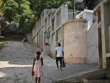 People walk by the entrance of the Congregation of Sisters of St. Anne in Port-au-Prince, Jan. 22, 2024. Eight people, including six nuns, were kidnapped Jan. 19 in Haiti's capital Port-au-Prince, according to the country's association of religious orders, amid an ongoing upswing in abductions.