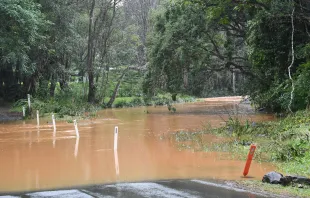 A flooded road is seen in the village of Tintenbar after heavy rain on April 5, 2024, in Ballina, Australia. Credit: James D. Morgan/Getty Images