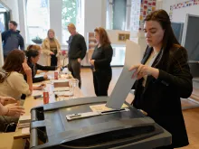 People cast their ballot in a polling station on June 6, 2024, in The Hague, Netherlands. Voters in 27 European Union countries go to the polls over the next four days to elect members of the European Parliament.