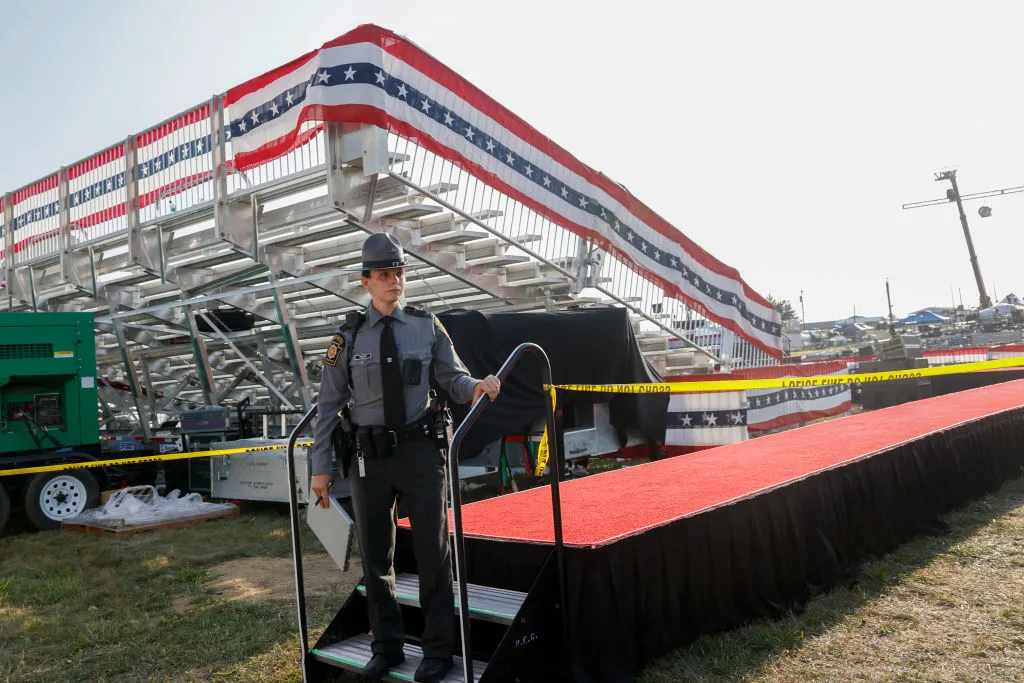 Law enforcement agents stand near the stage of a campaign rally for Republican presidential candidate Donald Trump on July 13, 2024, in Butler, Pennsylvania, after an assassination attempt on the former president.?w=200&h=150