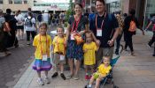 Steven and Joelle Schlotter, from Louisville, Kentucky, created special homemade T-shirts for their children in honor of the National Eucharistic Congress.