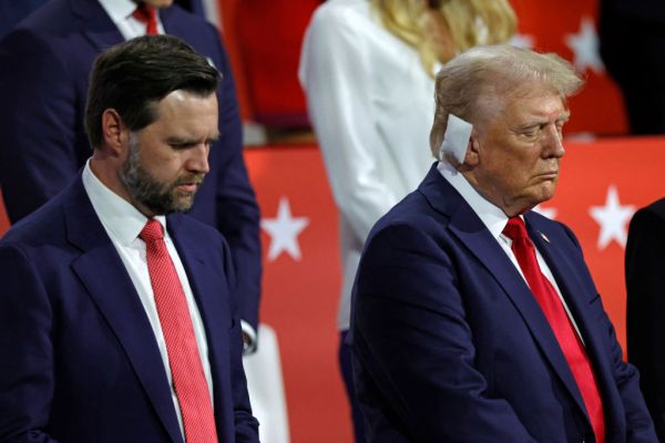 Republican vice presidential candidate J.D. Vance and former president Donald Trump bow in prayer during the last day of the 2024 Republican National Convention at the Fiserv Forum in Milwaukee on July 18, 2024. Credit: KAMIL KRZACZYNSKI/AFP via Getty Images