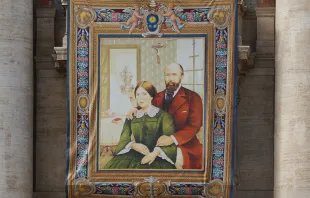 A tapestry of Blessed Louis and Zelie Martin, parents of St. Therese of Lisieux, hangs in St. Peter’s Square at the Vatican on Oct. 16, 2015, in preparation for their canonization. Credit: Daniel Ibanez/CNA