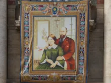 A tapestry of Blessed Louis and Zelie Martin, parents of St. Therese of Lisieux, hangs in St. Peter’s Square at the Vatican on Oct. 16, 2015, in preparation for their canonization.