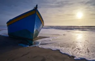 A migrant boat on the beach at Camposoto San Fernando Cádiz, Spain. Credit: Shutterstock