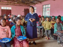 Sister Medhin with school children in Tigray, Ethiopia, in March 2024. The Scotland-based organization Mary’s Meals, which feeds almost 2.5 million children in some of the world’s poorest countries, has been partnering with the Daughters of Charity in Tigray since 2017 to provide meals for thousands of children.