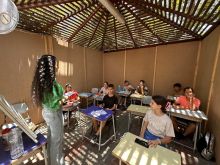 Some young people from Gaza during study aid activities in a gazebo inside the compound of the Latin Parish of the Holy Family. Beginning June 10, 2024, about 150 children and teenagers ages 4 to 17 who are sheltering in the Latin parish and in the Orthodox parish have taken up their books and notebooks again to reconnect with their studies. Three gazebos in the garden host study groups. They were open-sided, but they have been closed to help the youth avoid distractions, as there are always people around.