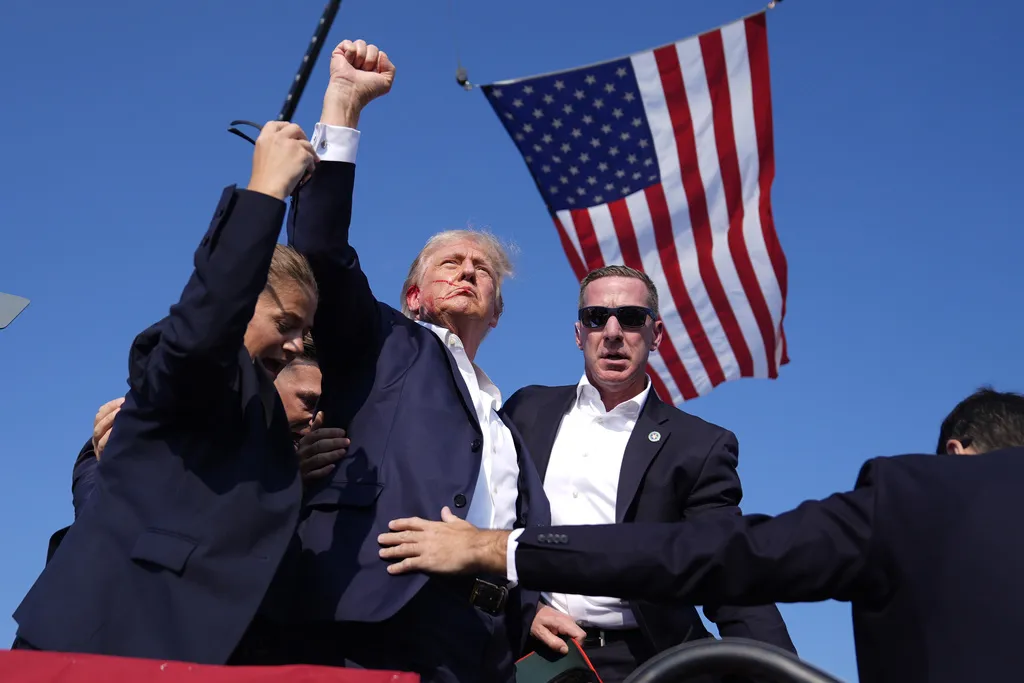 Republican presidential candidate former President Donald Trump is surrounded by U.S. Secret Service agents at a campaign rally, Saturday, July 13, 2024, in Butler, Pennsylvania.?w=200&h=150