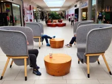 Young people use mobile devices in isolation from each other at Willowbrook Mall in Langley, British Columbia. In their pastoral letter on social media, the Canadian bishops suggest fasting from screens once a week and taking a “Technology Sabbath.”