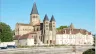 Roman Basilica of the Sacred Heart of Paray-le-Monial and cloister. View from the Bourbince River, 2023.