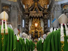 Bishops process into St. Peter's Basilica for the closing Mass of the first assembly of the Synod on Synodality on Oct. 29, 2023.