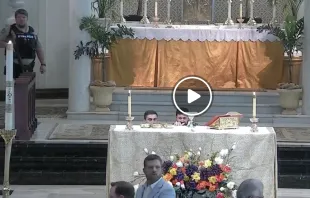 As parishioners and police respond to the threat of an armed intruder, clergy at St. Mary Magdalene Catholic Church in Abbeville, Louisiana take cover behind the altar on May 11, 2024. Credit: St. Mary Magdalen Catholic Church in Abbeville, Louisiana