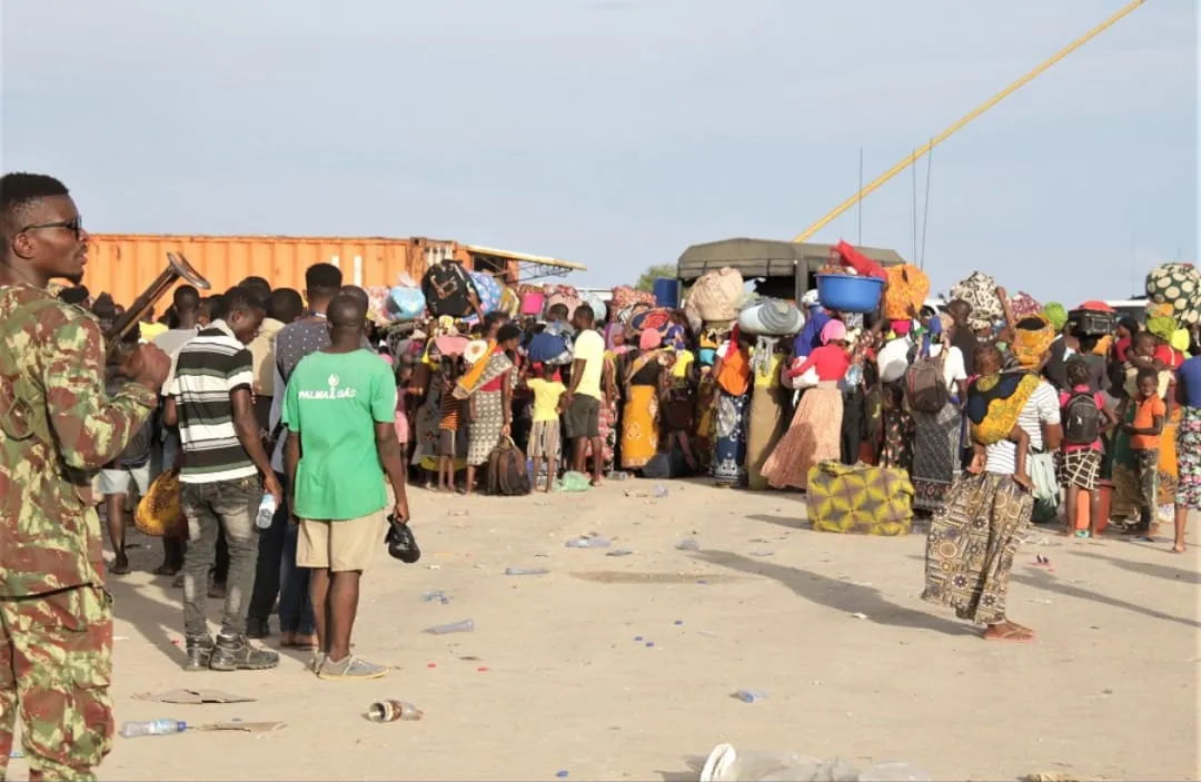 A group of women and children guarded by security forces in Mucimboa da Praia of Mozambique’s Cabo Delgado Province in early September 2023. Credit: Denis Hurley Peace Institute